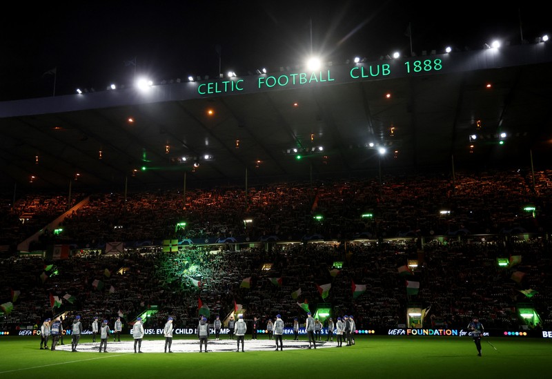 Soccer Football - Champions League - Group E - Celtic v Atletico Madrid - Celtic Park, Glasgow, Scotland, Britain - October 25, 2023 Celtic fans display Palestinian flags in support of Palestine amid the ongoing conflict between Israel and the Palestinian Islamist group Hamas before the match Action Images via Reuters/Jason Cairnduff