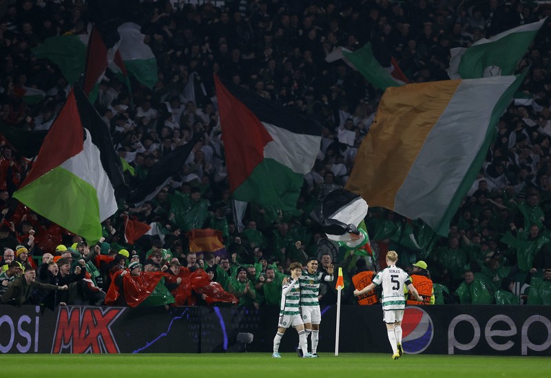 Soccer Football - Champions League - Group E - Celtic v Atletico Madrid - Celtic Park, Glasgow, Scotland, Britain - October 25, 2023 Celtic fans display Palestinian flags in support of Palestine amid the ongoing conflict between Israel and the Palestinian Islamist group Hamas before the match Action Images via Reuters/Jason Cairnduff