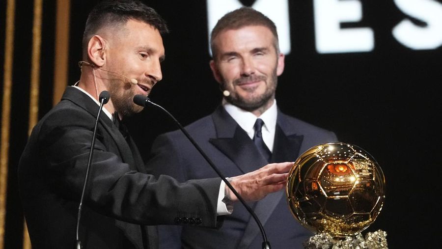 Inter Miami's and Argentina's national team player Lionel Messi receives the 2023 Ballon d'Or trophy during the 67th Ballon d'Or (Golden Ball) award ceremony at Theatre du Chatelet in Paris, France, Monday, Oct. 30, 2023. (AP Photo/Michel Euler)