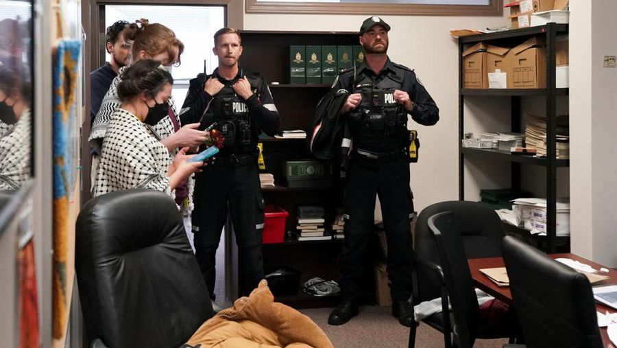 Supporters of Palestinian rights, calling for a ceasefire and end to the siege in Gaza, occupy the constituent office of Canada's Deputy Prime Minister and Finance Minister Chrystia Freeland in Toronto, Ontario, Canada October 30, 2023. REUTERS/Arlyn McAdorey