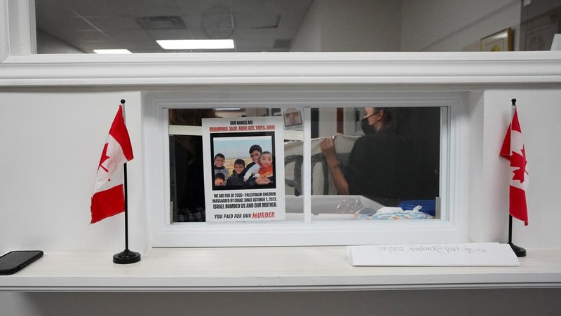 Supporters of Palestinian rights, calling for a ceasefire and end to the siege in Gaza, occupy the constituent office of Canada's Deputy Prime Minister and Finance Minister Chrystia Freeland in Toronto, Ontario, Canada October 30, 2023. REUTERS/Arlyn McAdorey