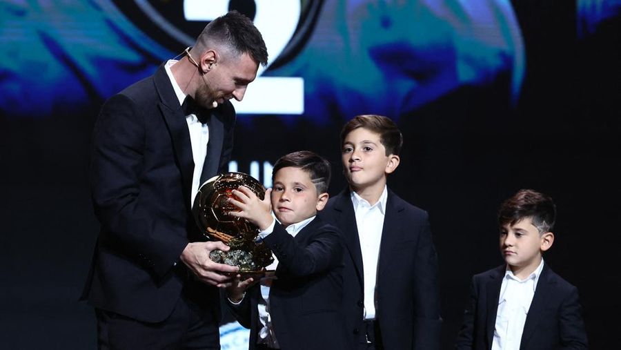Inter Miami's and Argentina's national team player Lionel Messi receives the 2023 Ballon d'Or trophy during the 67th Ballon d'Or (Golden Ball) award ceremony at Theatre du Chatelet in Paris, France, Monday, Oct. 30, 2023. (AP Photo/Michel Euler)