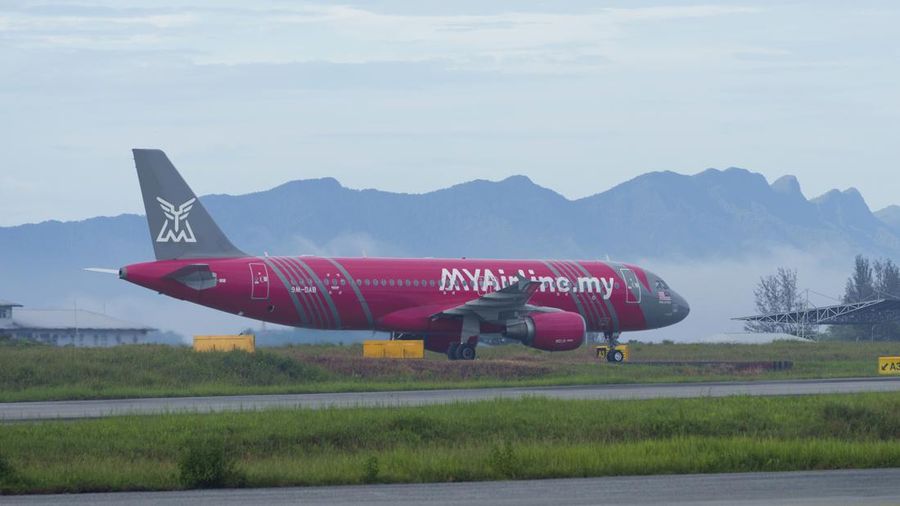 An Airbus A320-200 plane operate by Malaysian budget carrier MYAirline taxing at Miri airport in Kuching, Malaysia, on March 26, 2023. Malaysian budget carrier MyAirline abruptly suspended operations Thursday, citing financial pressures less than 11 months after it took to the skies. The unexpected announcement on social media caught many by surprise and left angry passengers stranded at the airport.(AP Photo/Vincent Thian)