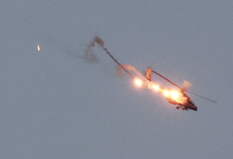 An Apache helicopter fires, amid the ongoing conflict between Israel and Palestinian Islamist group Hamas, as seen from Sderot in southern Israel, November 1, 2023. REUTERS/Ammar Awad