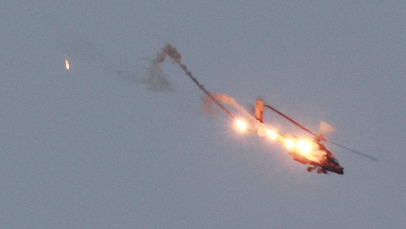 An Apache helicopter fires, amid the ongoing conflict between Israel and Palestinian Islamist group Hamas, as seen from Sderot in southern Israel, November 1, 2023. REUTERS/Ammar Awad