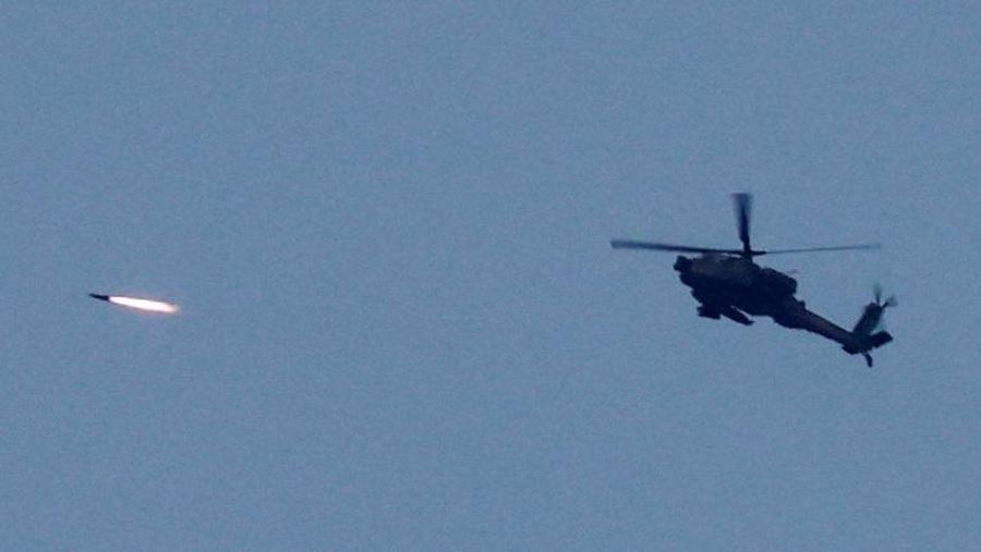 An Apache helicopter fires, amid the ongoing conflict between Israel and Palestinian Islamist group Hamas, as seen from Sderot in southern Israel, November 1, 2023. REUTERS/Ammar Awad