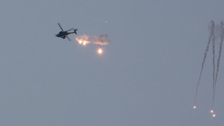 An Apache helicopter fires, amid the ongoing conflict between Israel and Palestinian Islamist group Hamas, as seen from Sderot in southern Israel, November 1, 2023. REUTERS/Ammar Awad