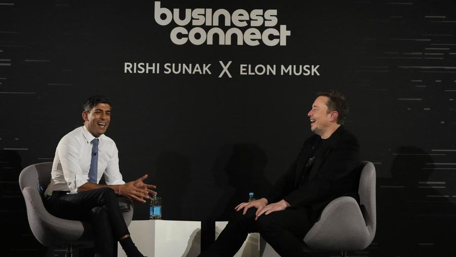 Britain's Prime Minister Rishi Sunak, left, attends an in-conversation event with Tesla and SpaceX's CEO Elon Musk in London, Thursday, Nov. 2, 2023. Sunak discussed AI with Elon Musk in a conversation that is played on the social network X, which Musk owns.(AP Photo/Kirsty Wigglesworth, Pool)