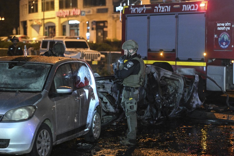 Israel Palestinians Lebanon Israeli police investigate the scene of a rocket attack from Lebanon in Kiryat Shmona, northern Israel, Thursday, Nov. 2, 2023. (AP Photo/Rami Shllush)