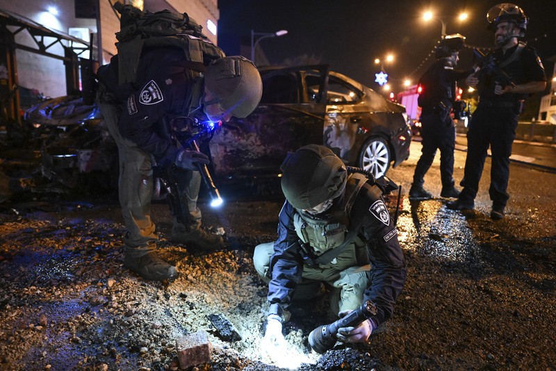Israel Palestinians Lebanon Israeli police investigate the scene of a rocket attack from Lebanon in Kiryat Shmona, northern Israel, Thursday, Nov. 2, 2023. (AP Photo/Rami Shllush)