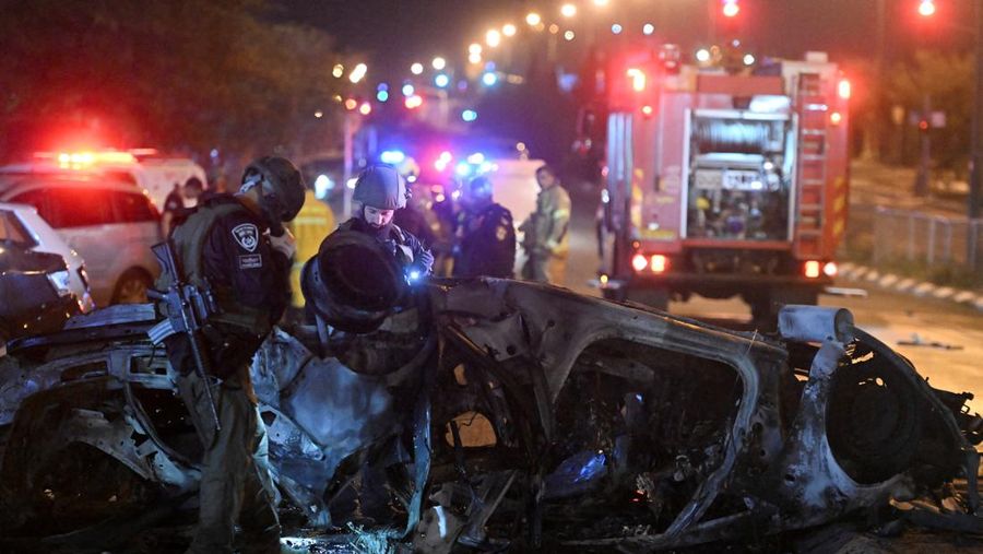 Israeli police investigate the scene of a rocket attack from Lebanon in Kiryat Shmona, northern Israel, Thursday, Nov. 2, 2023. (AP Photo/Rami Shllush)