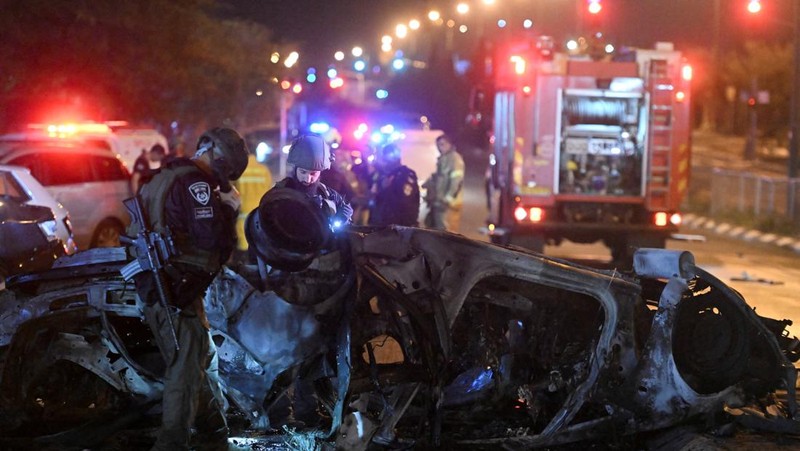 Israeli police investigate the scene of a rocket attack from Lebanon in Kiryat Shmona, northern Israel, Thursday, Nov. 2, 2023. (AP Photo/Rami Shllush)
