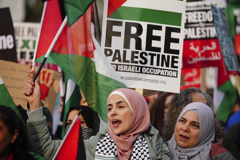 People take part in a pro Palestinian rally in Trafalgar Square, London, Saturday, Nov. 4, 2023. (Victoria Jones/PA via AP)