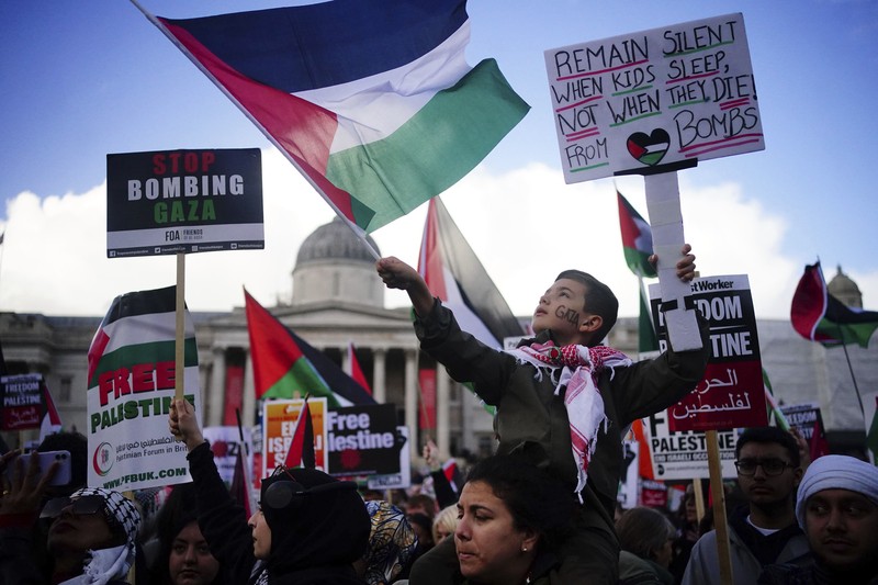 People take part in a pro Palestinian rally in Trafalgar Square, London, Saturday, Nov. 4, 2023. (Victoria Jones/PA via AP)
