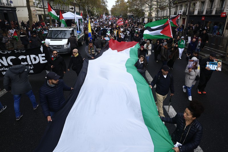 People take part in a pro Palestinian rally in Trafalgar Square, London, Saturday, Nov. 4, 2023. (Victoria Jones/PA via AP)