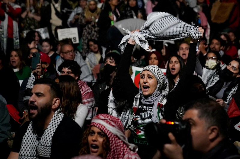 Demonstrators hold up props representing dead children, near the White House, in support of Palestinians in Gaza, amid the ongoing conflict between Israel and Hamas, in Washington, U.S., November 4, 2023. REUTERS/Elizabeth Frantz