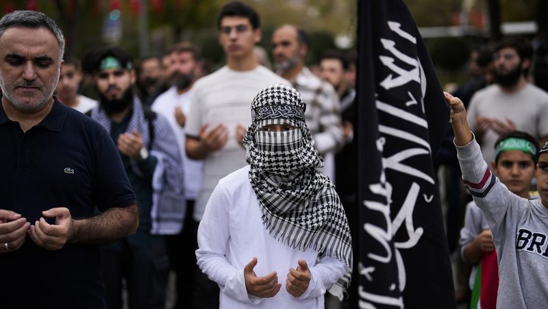 People take part in a pro Palestinian rally in Trafalgar Square, London, Saturday, Nov. 4, 2023. (Victoria Jones/PA via AP)