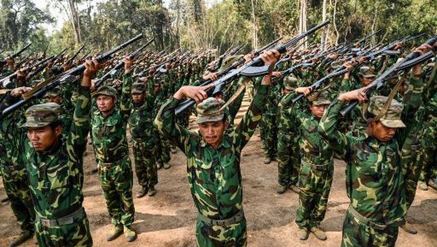 (FILES) In this photo taken on March 8, 2023 members of the ethnic rebel group Ta'ang National Liberation Army (TNLA) take part in a training exercise at their base camp in the forest in Myanmar's northern Shan State. An alliance of Myanmar ethnic armed groups is waging a lightning offensive against the military which analysts say is the biggest battlefield challenge to the junta since it seized power. (Photo by AFP)