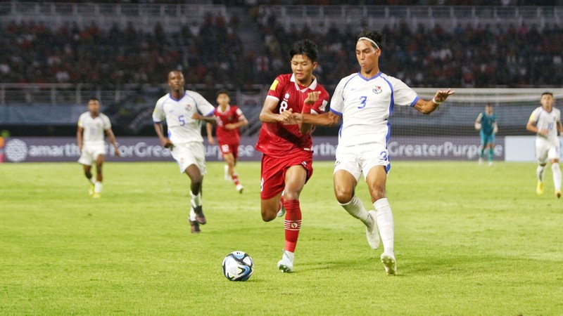 Pemain Timnas Indonesia U-17 Arkhan Purwanto (tengah) melakukan selebrasi bersama rekannya usai mencetak gol ke gawang Panama dalam lanjutan Piala Dunia U-17 di Stadion Gelora BUng Tomo, Surabaya, Jawa Timur, Senin (13/11/2023) malam. (Robertus Pudyanto - FIFA/FIFA via Getty Images) Pemain Timnas Indonesia U-17 Arkhan Purwanto (tengah) melakukan selebrasi bersama rekannya usai mencetak gol ke gawang Panama dalam lanjutan Piala Dunia U-17 di Stadion Gelora BUng Tomo, Surabaya, Jawa Timur, Senin (13/11/2023) malam. (Robertus Pudyanto - FIFA/FIFA via Getty Images)
