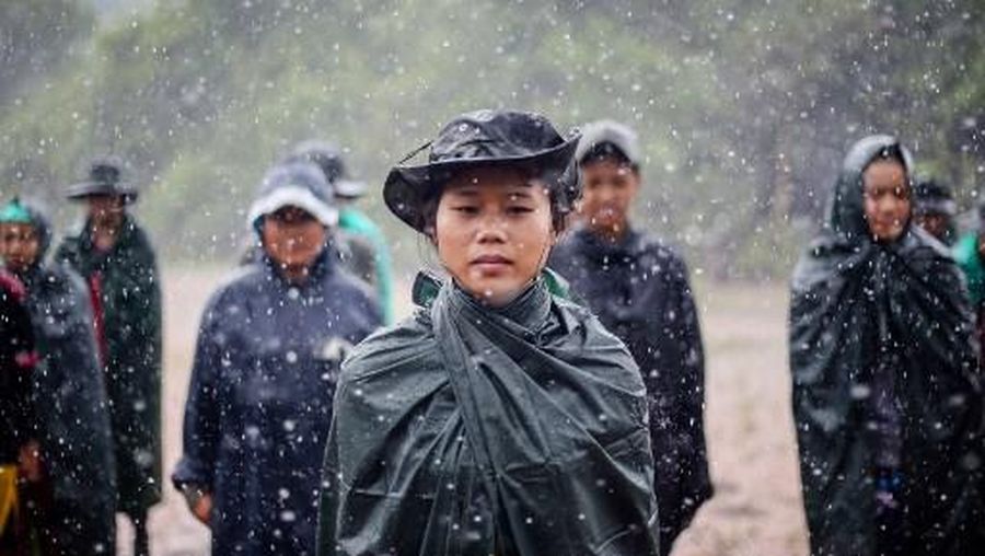 This handout from the Karenni Nationalities Defence Force (KNDF) taken on May 23, 2022 and received on May 30 shows members of the KNDF taking part in a training session for female special forces members and women battalions at their base camp in the forest near Demoso in Myanmar's eastern Kayah state. (Photo by Handout / KARENNI NATIONALITIES DEFENSE FORCE (KNDF) / AFP) / -----EDITORS NOTE --- RESTRICTED TO EDITORIAL USE - MANDATORY CREDIT