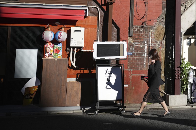 Jepang di ambang Resesi. (AP Photo/Eugene Hoshiko, File)