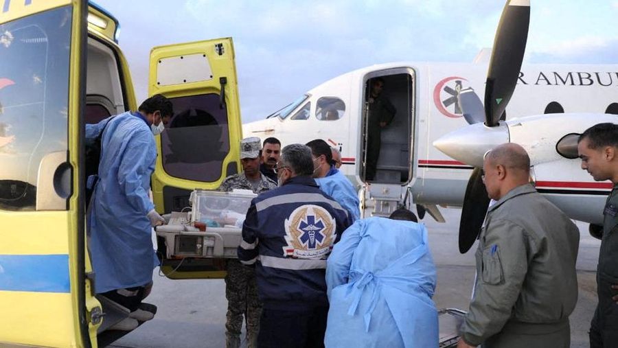 Medics transport a premature Palestinian baby evacuated from Gaza to an Air Ambulance on the Egyptian side at Al-Arish Airport, amid the ongoing conflict between Israel and the Palestinian Islamist group Hamas, in the city of Al-Arish, Sinai peninsula, Egypt, in this handout picture, November 20, 2023. The Egyptian Health Ministry/Handout via REUTERS ATTENTION EDITORS - THIS IMAGE WAS PROVIDED BY A THIRD PARTY