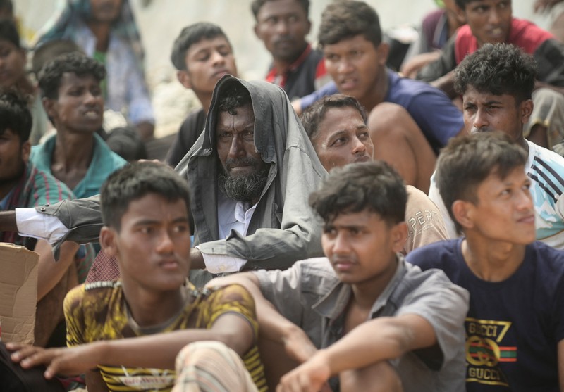 A wooden boat that carried Rohingya Muslims is seen off the coast in Sabang, Aceh province, Indonesia, November 22, 2023. REUTERS/Riska Munawarah