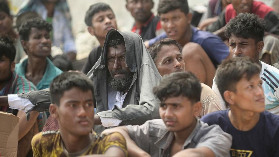 A wooden boat that carried Rohingya Muslims is seen off the coast in Sabang, Aceh province, Indonesia, November 22, 2023. REUTERS/Riska Munawarah