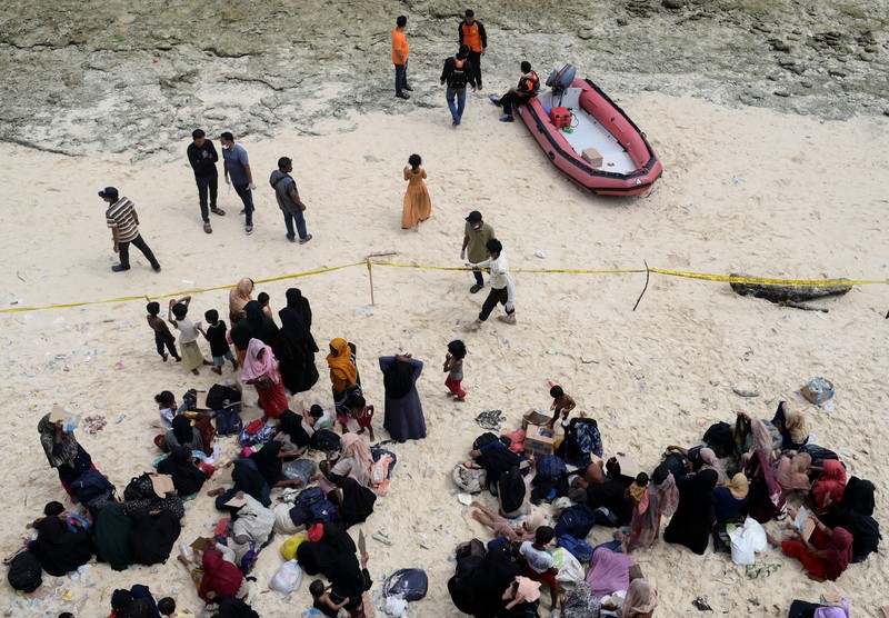 A wooden boat that carried Rohingya Muslims is seen off the coast in Sabang, Aceh province, Indonesia, November 22, 2023. REUTERS/Riska Munawarah