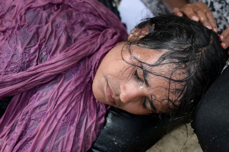 MIGRATION-INDONESIA/ROHINGYA A wooden boat that carried Rohingya Muslims is seen off the coast in Sabang, Aceh province, Indonesia, November 22, 2023. REUTERS/Riska Munawarah