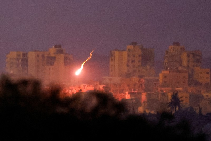 An explosion takes place during Israeli air strikes over Gaza, as seen from southern Israel, amid the ongoing conflict between Israel and the Palestinian group Hamas, November 22, 2023. REUTERS/Alexander Ermochenko