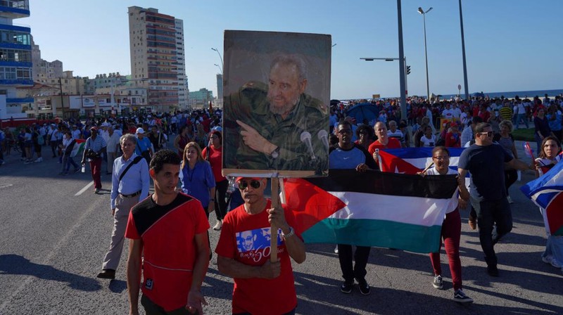 People shout slogans during a march in support of Palestinians, calling for a ceasefire and for charging Israel with committing “genocide” in Gaza, in Havana, Cuba, November 23, 2023. REUTERS/Alexandre Meneghini