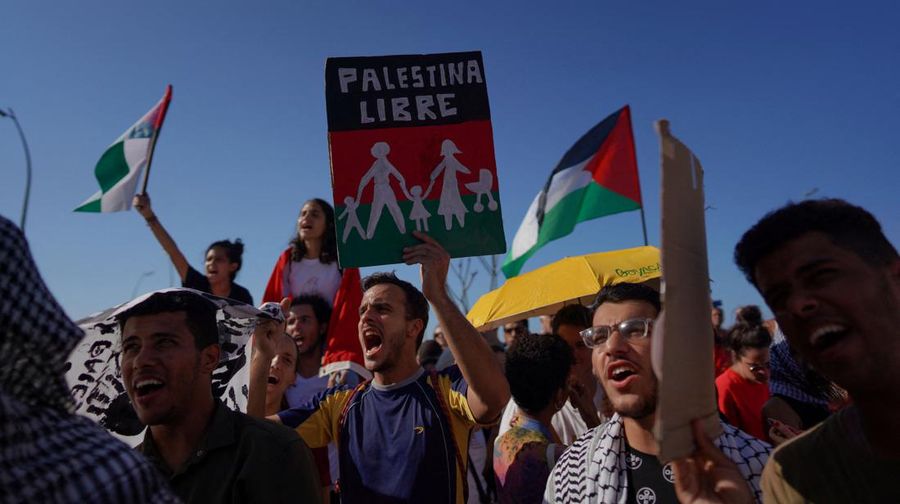 People shout slogans during a march in support of Palestinians, calling for a ceasefire and for charging Israel with committing “genocide” in Gaza, in Havana, Cuba, November 23, 2023. REUTERS/Alexandre Meneghini