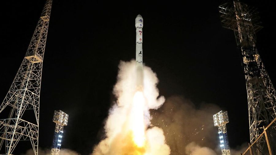 North Korean leader Kim Jong Un looks on as a rocket carrying a spy satellite Malligyong-1 is launched, as North Korean government claims, in a location given as North Gyeongsang Province, North Korea in this handout picture obtained by Reuters on November 21, 2023.  KCNA via REUTERS    ATTENTION EDITORS - THIS IMAGE WAS PROVIDED BY A THIRD PARTY. REUTERS IS UNABLE TO INDEPENDENTLY VERIFY THIS IMAGE. NO THIRD PARTY SALES. SOUTH KOREA OUT. NO COMMERCIAL OR EDITORIAL SALES IN SOUTH KOREA.