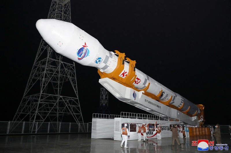 NKOREA-SATELLITE/ North Korean leader Kim Jong Un looks on as a rocket carrying a spy satellite Malligyong-1 is launched, as North Korean government claims, in a location given as North Gyeongsang Province, North Korea in this handout picture obtained by Reuters on November 21, 2023. KCNA via REUTERS ATTENTION EDITORS - THIS IMAGE WAS PROVIDED BY A THIRD PARTY. REUTERS IS UNABLE TO INDEPENDENTLY VERIFY THIS IMAGE. NO THIRD PARTY SALES. SOUTH KOREA OUT. NO COMMERCIAL OR EDITORIAL SALES IN SOUTH KOREA.