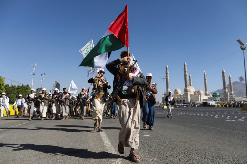 Newly recruited fighters who joined a Houthi military force intended to be sent to fight in support of the Palestinians in the Gaza Strip, march during a parade in Sanaa, Yemen December 2, 2023. REUTERS/Khaled Abdullah