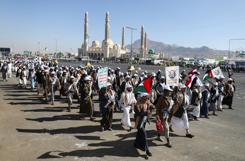 Newly recruited fighters who joined a Houthi military force intended to be sent to fight in support of the Palestinians in the Gaza Strip, march during a parade in Sanaa, Yemen December 2, 2023. REUTERS/Khaled Abdullah