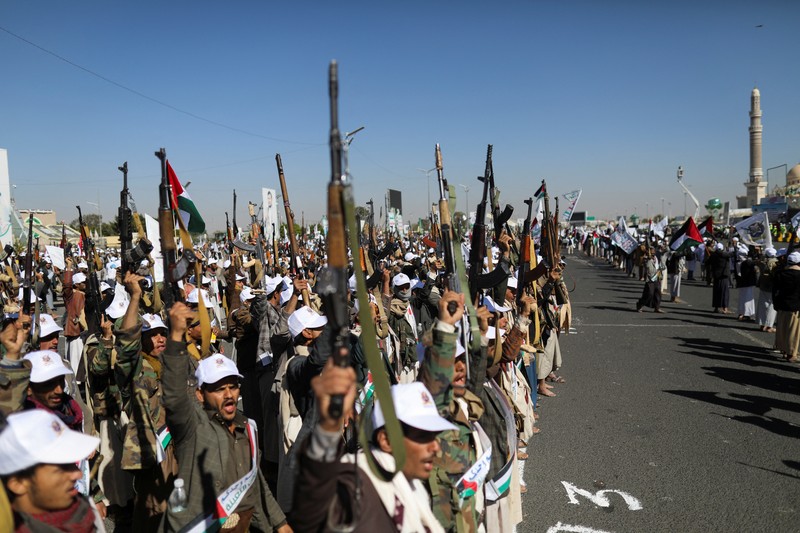 Newly recruited fighters who joined a Houthi military force intended to be sent to fight in support of the Palestinians in the Gaza Strip, march during a parade in Sanaa, Yemen December 2, 2023. REUTERS/Khaled Abdullah