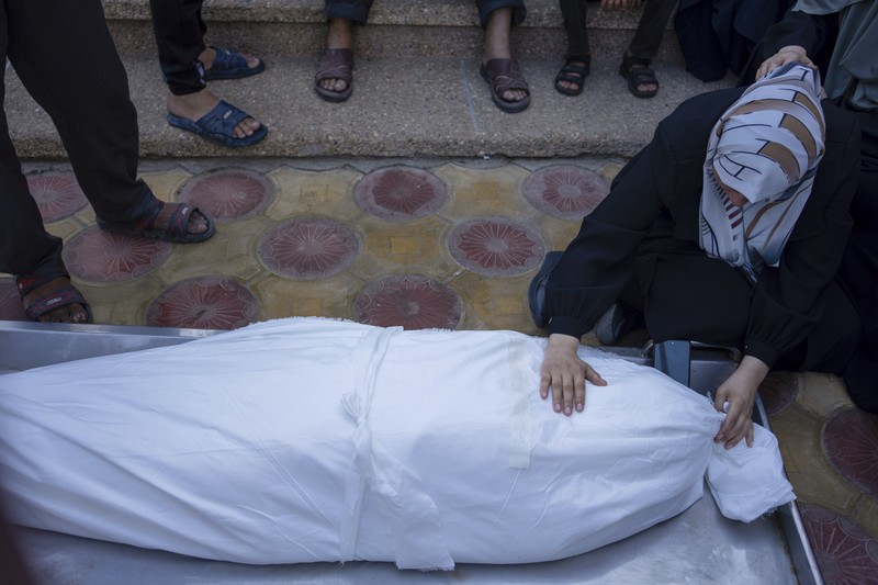 Kepulan asap saat terjadi pertempuran antara Israel dan militan Hamas di Jalur Gaza, Minggu (3/12/2023). (John MACDOUGALL / AFP) Kepulan asap saat terjadi pertempuran antara Israel dan militan Hamas di Jalur Gaza, Minggu (3/12/2023). (John MACDOUGALL / AFP)