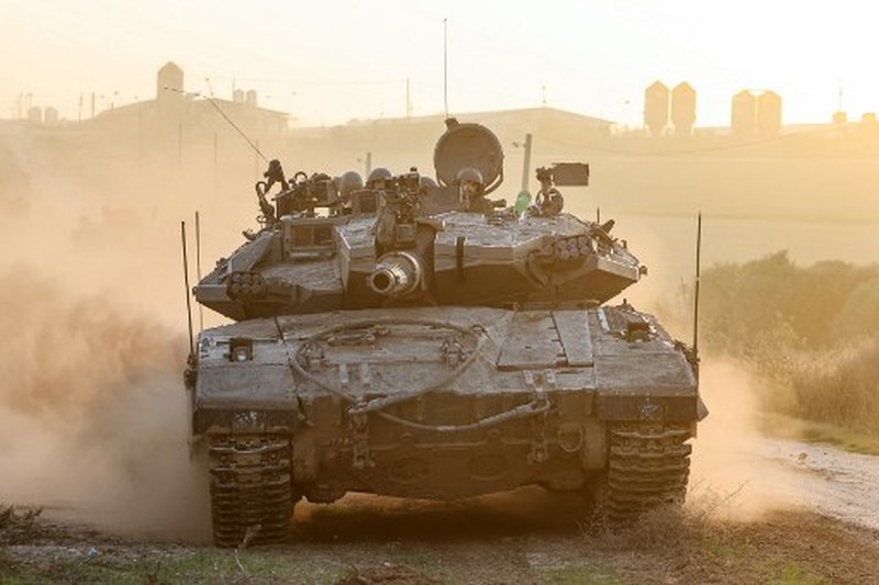 Kepulan asap saat terjadi pertempuran antara Israel dan militan Hamas di Jalur Gaza, Minggu (3/12/2023). (John MACDOUGALL / AFP) Kepulan asap saat terjadi pertempuran antara Israel dan militan Hamas di Jalur Gaza, Minggu (3/12/2023). (John MACDOUGALL / AFP)