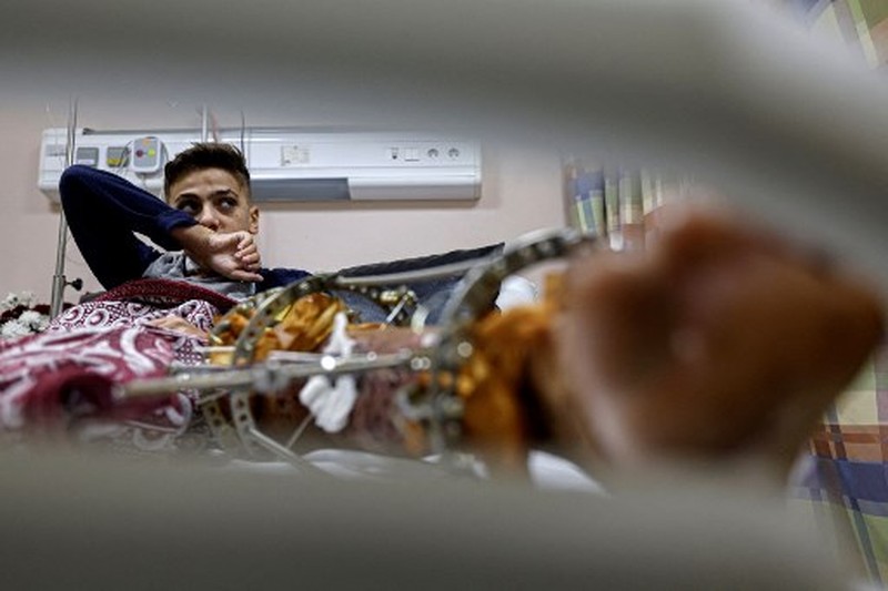Kepulan asap saat terjadi pertempuran antara Israel dan militan Hamas di Jalur Gaza, Minggu (3/12/2023). (John MACDOUGALL / AFP) Kepulan asap saat terjadi pertempuran antara Israel dan militan Hamas di Jalur Gaza, Minggu (3/12/2023). (John MACDOUGALL / AFP)