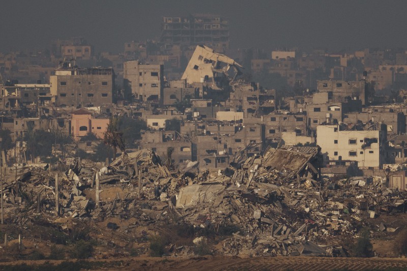 Kepulan asap saat serangan militer Israel di Jalur Gaza, Kamis (7/12/2023). Menahem KAHANA / AFP) Kepulan asap saat serangan militer Israel di Jalur Gaza, Kamis (7/12/2023). Menahem KAHANA / AFP)