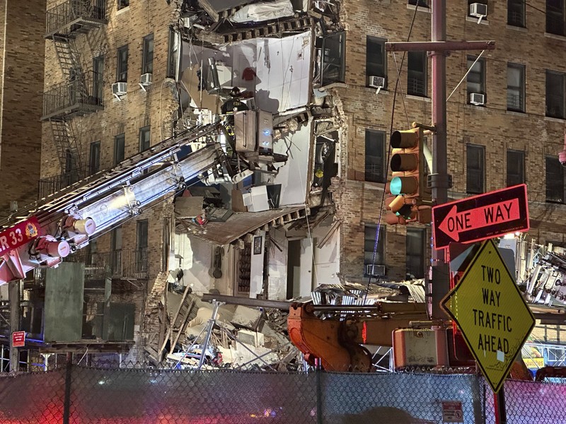 Building Collapse Bronx Debris piles up after a building collapsed in the Bronx borough of New York, Monday, Dec. 11, 2023. (AP Photo/Yuki Iwamura)