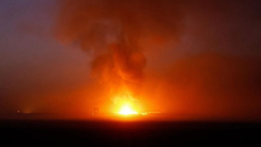 A fire burns in Gaza, amid the ongoing conflict between Israel and the Palestinian Islamist group Hamas, as seen from southern Israel, December 11, 2023. REUTERS/Clodagh Kilcoyne
