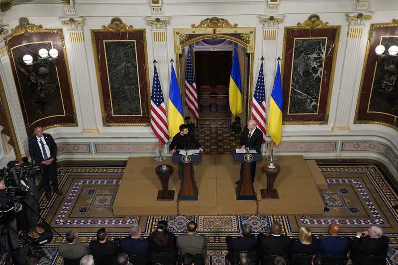 Biden US Ukraine Ukrainian President Volodymyr Zelenskyy speaks during a news conference with President Joe Biden in the Indian Treaty Room in the Eisenhower Executive Office Building on the White House Campus, Tuesday, Dec. 12, 2023, in Washington. (AP Photo/Evan Vucci)