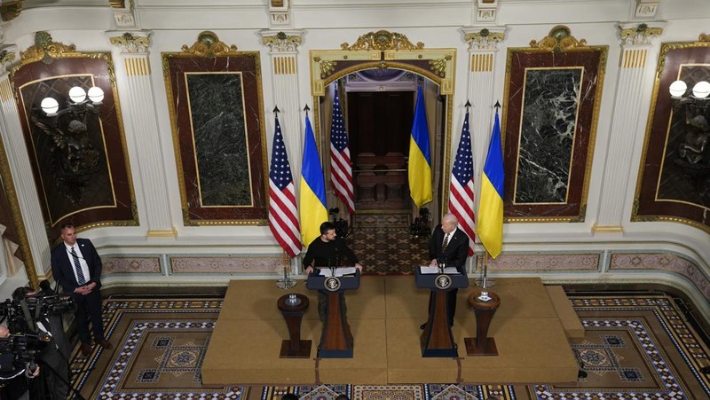 Ukrainian President Volodymyr Zelenskyy speaks during a news conference with President Joe Biden in the Indian Treaty Room in the Eisenhower Executive Office Building on the White House Campus, Tuesday, Dec. 12, 2023, in Washington. (AP Photo/Evan Vucci)