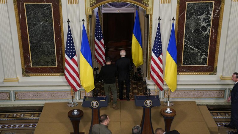 Ukrainian President Volodymyr Zelenskyy speaks during a news conference with President Joe Biden in the Indian Treaty Room in the Eisenhower Executive Office Building on the White House Campus, Tuesday, Dec. 12, 2023, in Washington. (AP Photo/Evan Vucci)