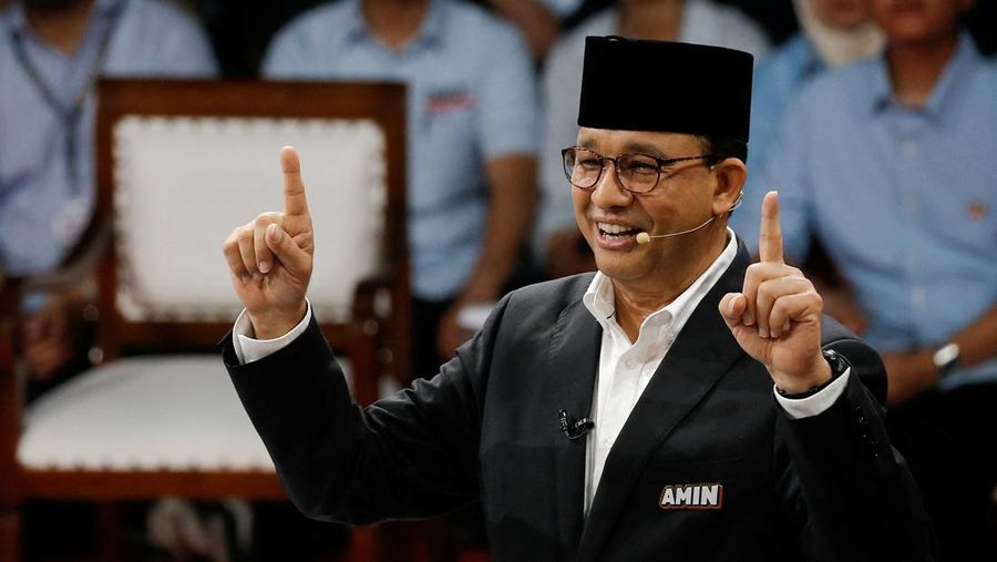 Former Jakarta Governor and presidential candidate Anies Baswedan gestures during a televised debate at the election commission headquarters in Jakarta, Indonesia, December 12, 2023. REUTERS/Ajeng Dinar Ulfiana