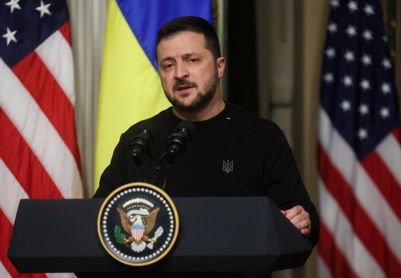 Biden US Ukraine Ukrainian President Volodymyr Zelenskyy speaks during a news conference with President Joe Biden in the Indian Treaty Room in the Eisenhower Executive Office Building on the White House Campus, Tuesday, Dec. 12, 2023, in Washington. (AP Photo/Evan Vucci)