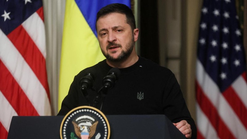 Ukrainian President Volodymyr Zelenskyy speaks during a news conference with President Joe Biden in the Indian Treaty Room in the Eisenhower Executive Office Building on the White House Campus, Tuesday, Dec. 12, 2023, in Washington. (AP Photo/Evan Vucci)